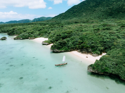 Tropical beaches with Sabani (traditional Okinawan saiboat), Japan off-the-beaten-path drone photography by Ippei and Janine