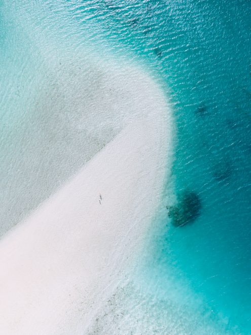 Sandbank in tropical lagoon, Japan off-the-beaten-path drone photography by Ippei and Janine