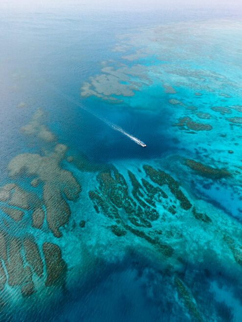 Aerial view of coral reef, Okinawa, Japan off-the-beaten-path drone photography by Ippei and Janine