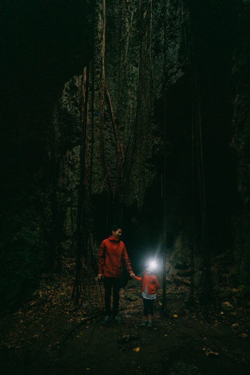 Exploring one of many caves on Irabu Island, Japan