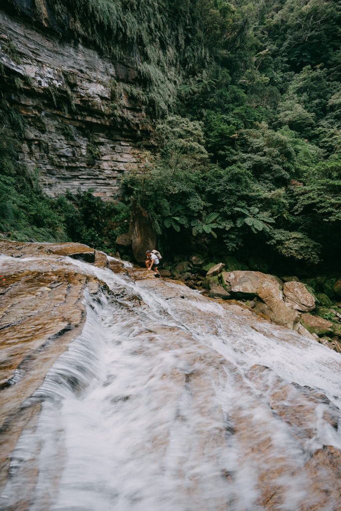 Climbing up Mayagusuku Waterfall, Iriomote Island, Okinawa, Japan