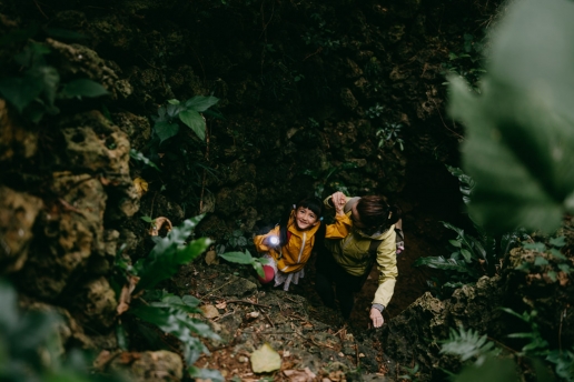 Exploring jungle cave, Miyako Island, Okinawa, Japan