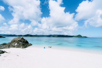 Amami Oshima's white sand beach with clear tropical water, Sakibaru Beach