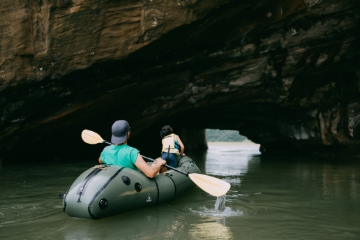 Packrafting through one of many sea caves of Tanegashima Island, Kagoshima, Japan