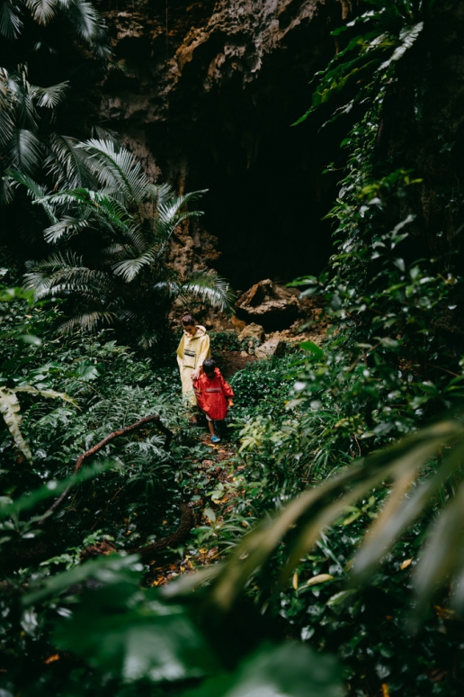 Hiking through jungle cave in Okinawa, Kume Island, Japan