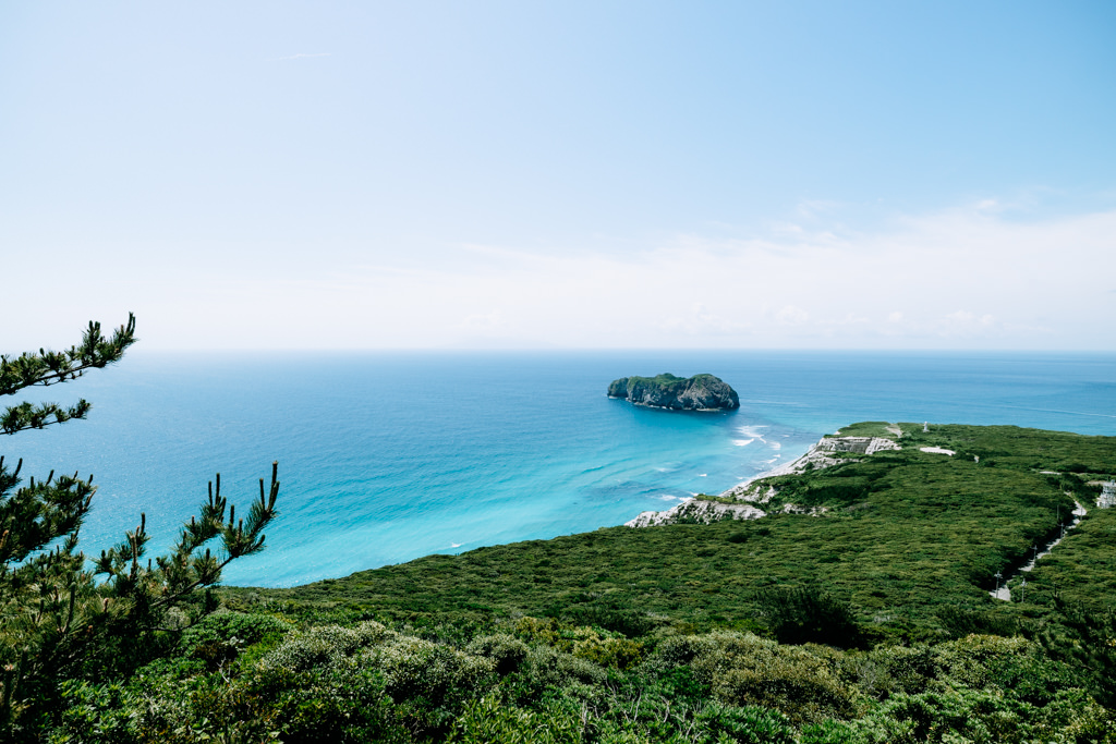 Lush evergreen forests and clear blue sea of Niijima Island, Tokyo