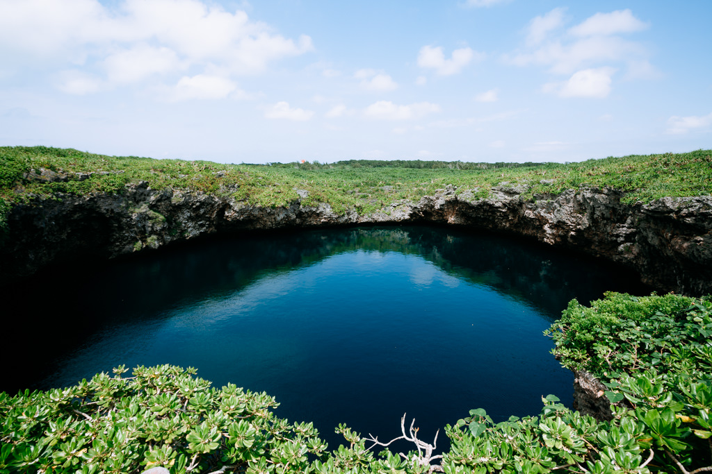 Blue hole connected to the sea by underwater cave, Shimoji Island, Okinawa