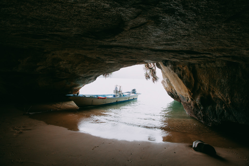 Exploring sea cave of Iriomote Island, Okinawa, Japan